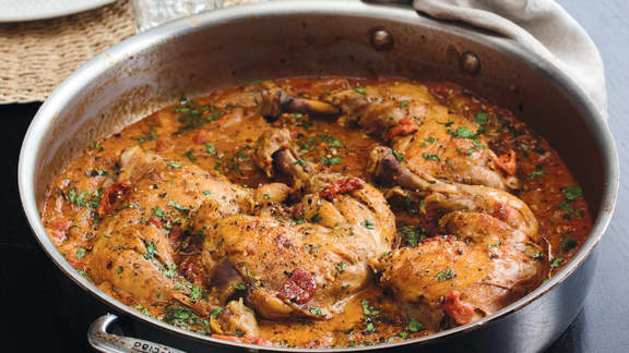 Quel est le temps de cuisson pour les hauts de cuisse de poulet à la friteuse à air (air fryer) ?