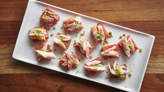 Bouchées de crabe des neiges sur melon mariné et estragon