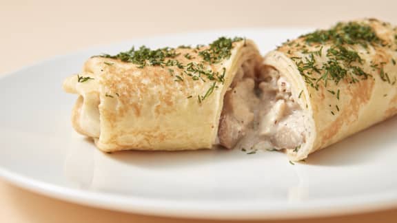 Crêpes au poulet et petits pois au four