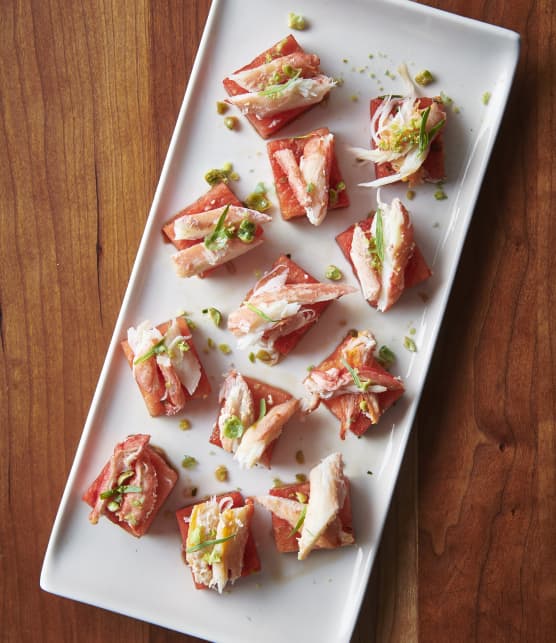 Bouchées de crabe des neiges sur melon mariné et estragon