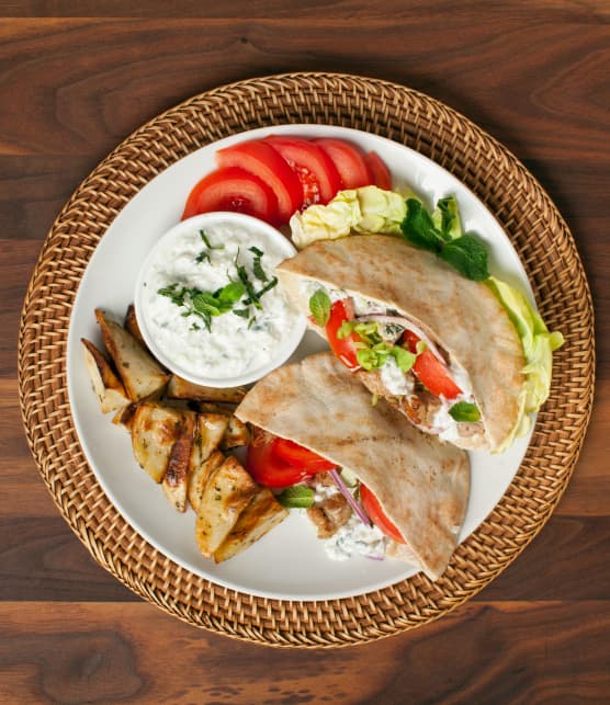 Pitas au porc et sauce crémeuse