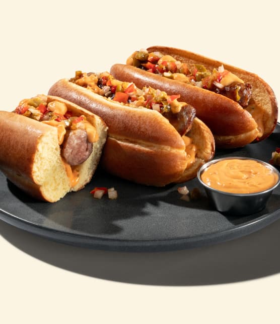 Hot-dogs à la saucisse Bratwurst, sauce crémeuse aux poivrons