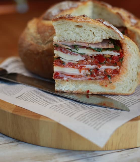 Muffuletta au pesto et roquette